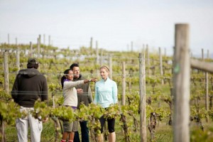 Actors talking to art director on set of healthcare commercial