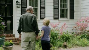 Healthcare spot Grandpa walks with grand daughter